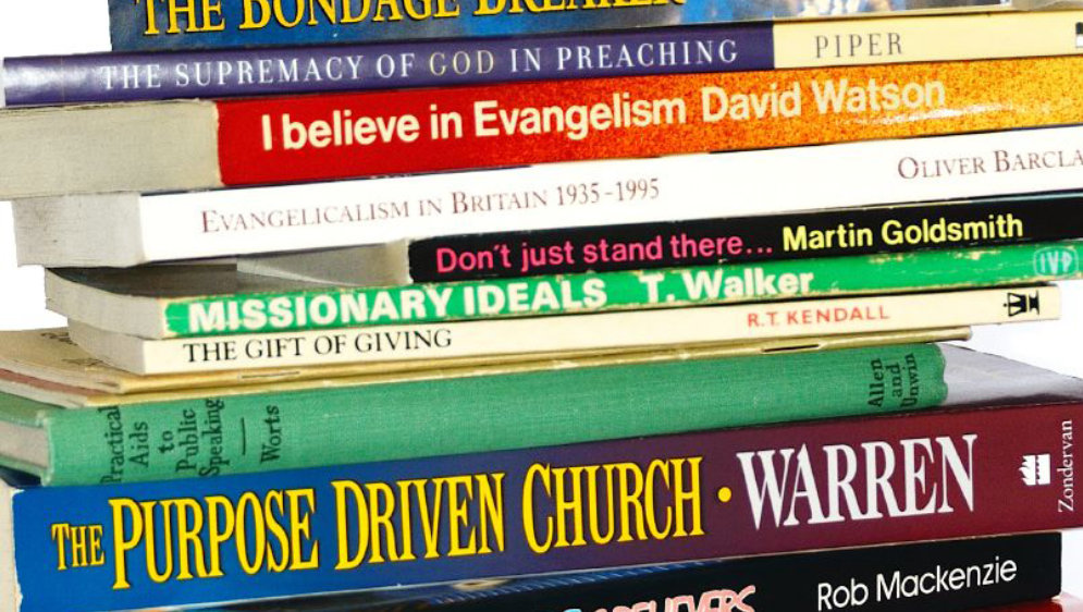 A stack of Christian books.
